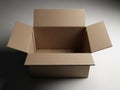 Open cardboard box with flaps extended against dark background Royalty Free Stock Photo