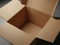 Open cardboard box on gray surface, ready for packing or storage Royalty Free Stock Photo