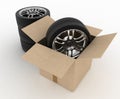 Open Cardboard Box with Tires