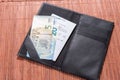 Open check folder with bill and euro banknotes Royalty Free Stock Photo