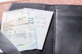 Open check folder with bill and euro banknotes Royalty Free Stock Photo