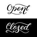 Open, closed. Handwritten words on white and black background Royalty Free Stock Photo