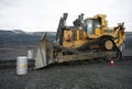 Extraction of minerals. Heavy powerful bulldozer in the quarry