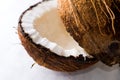 Open coconut on white