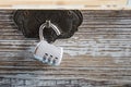 Open combination lock on a wooden box