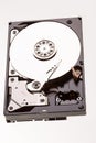 Open computer hard drive disc on white Royalty Free Stock Photo