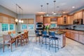 Open concept kitchen and dining room with windows