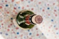 open cork wine bottle protection on rustic tablecloth Royalty Free Stock Photo