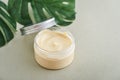 Open cosmetic cream container