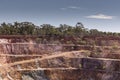 Open cut gold mine and water reservoir in regional Australia Royalty Free Stock Photo