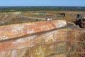 Open cut mine with clear blue sky Royalty Free Stock Photo