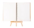 Open diary ring binder on small tripod for painting. isolated on Royalty Free Stock Photo