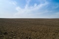 Open dirt farmland.