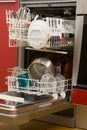 Open dishwasher with clean dishes