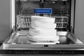 Open dishwasher in the kitchen Royalty Free Stock Photo