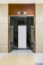 Open door with blank sign in side the out of order elevator Royalty Free Stock Photo