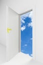 Open door with cloudy blue sky behind it Royalty Free Stock Photo