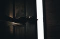 Open the door in dark room to the light Royalty Free Stock Photo