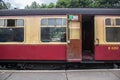 Open door in heritage railway carriate on platform ready for people to board