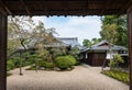 Open door to Japanese garden in early autumn Royalty Free Stock Photo