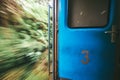 Open door in train wagon during it moving Royalty Free Stock Photo