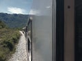 An open door view from a train on the line Podgorica - Bar near Scadar lake Royalty Free Stock Photo