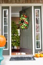 Open doorway to an inviting Christmas scene