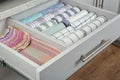 Drawer with folded towels. Order in kitchen Royalty Free Stock Photo