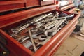 An Open Drawer Red Toolbox showing Shifters, Spanners & Sockets. Royalty Free Stock Photo