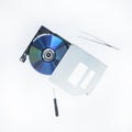 Open DVD-ROM tray with CD inside next to tools Royalty Free Stock Photo