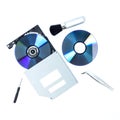 Open DVD-ROM tray with CD inside next to tools Royalty Free Stock Photo