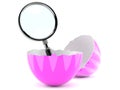 Open easter egg with magnifying glass Royalty Free Stock Photo