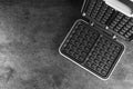 Open electric waffle maker on dark grey table, top view. Space for text Royalty Free Stock Photo