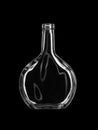 Open empty bottle for brandy or cognac. Isolated on black background Royalty Free Stock Photo