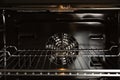 Open empty electric oven with rack Royalty Free Stock Photo