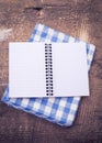 Open empty notebook on wooden background Royalty Free Stock Photo