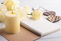 Notebook with yellow lisianthus flowers