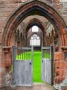 Sweetheart Abbey with Open Entrance Gate to the Ruins, New Abbey, Dumfries and Galloway, Scotland, Great Britain