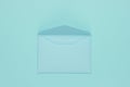 Open Envelope blue pastel color. Flat lay mockup for valentines day, wedding or birthday. Top view
