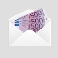 Open envelope and 500 euro bills cash