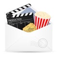 Open envelope with movie clapper board. Royalty Free Stock Photo