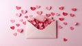 Open envelope with pink and red paper hearts on light pink background Royalty Free Stock Photo