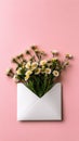 Open Envelope with Wildflowers on Pink Background Royalty Free Stock Photo