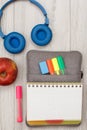 Open exercise book on bag-pencil case with color felt pens and m Royalty Free Stock Photo