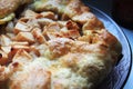 Open face apple pie close up view