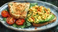 Open faced avocado and scrambled eggs sandwich with tomatoes Royalty Free Stock Photo