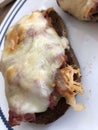 open faced Reuben sandwich with swiss cheese melted and toasted, Pumpernickel bread Royalty Free Stock Photo