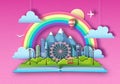 Open fairy tale book with city landscape, ferris wheel and mountains. Cut out paper art style design Royalty Free Stock Photo