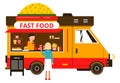 Open fast food truck with customer buying snack