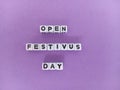 Open festivus day sign on a purple background